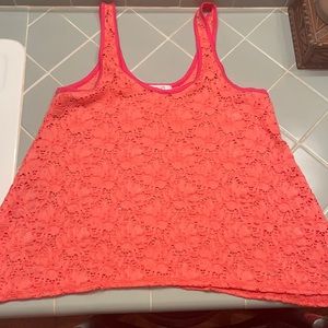 Size XS (runs big)loose top.